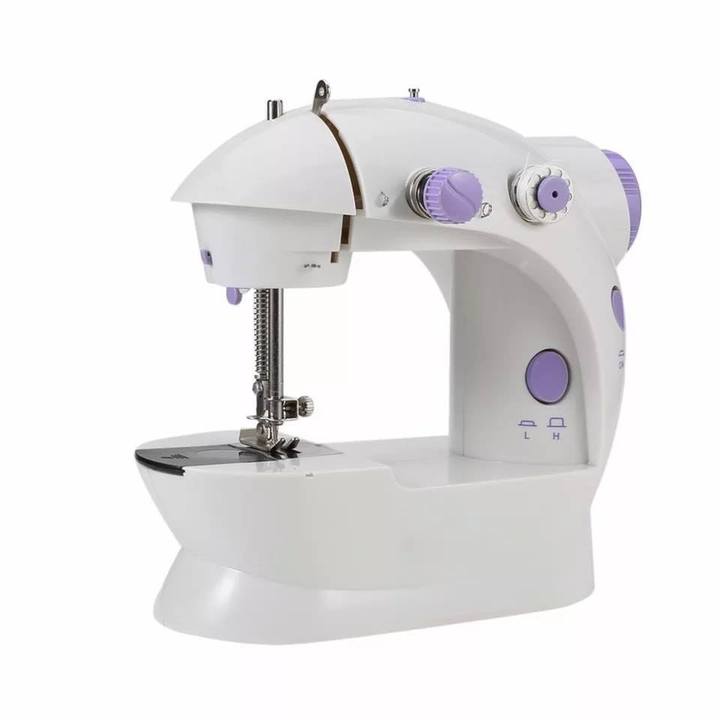 Machine à coudre portable - آلة خياطة محمولة